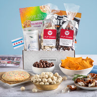 Thumbnail for Open gift basket labeled ‘Chicago Gourmet Goodness’ with cookies, caramels, chocolate, coffee, and hot sauce.