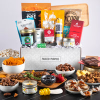 Thumbnail for Charcuterie gift set labeled ‘Deluxe Charcuterie Board’ with preserves, salami, almonds, crackers, and tapenade.