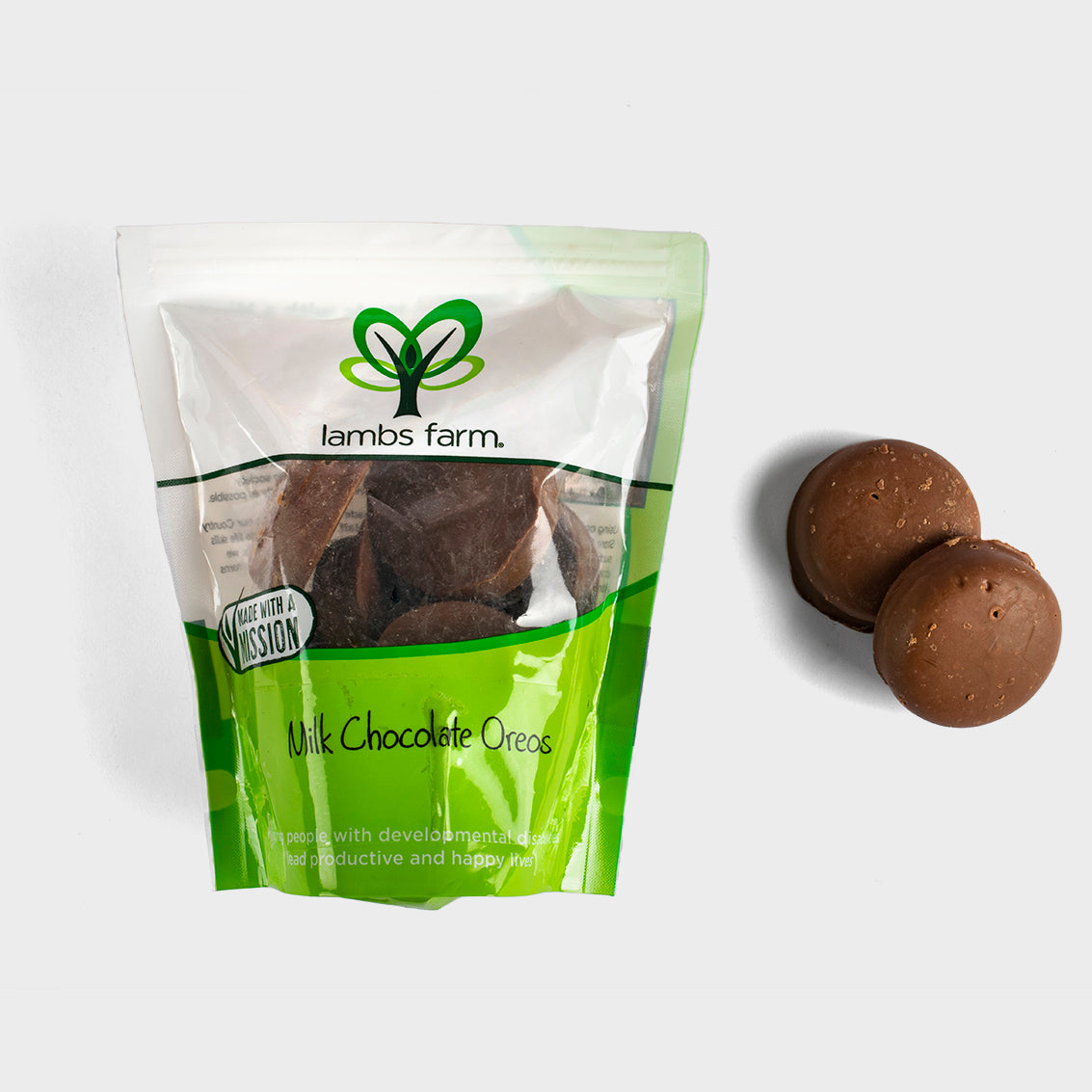 Lambs Farm Milk Chocolate Oreos in a resealable green and white pouch, with two chocolate-dipped cookies shown