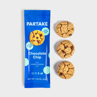 Thumbnail for Package of Crunchy, Chocolate Chip Cookies by Partake placed next to three individual chocolate chip cookies