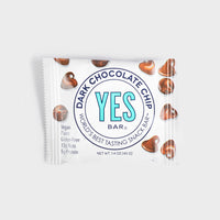 Thumbnail for YES Bar Dark Chocolate Chip snack bar in white packaging with chocolate chip illustrations, vegan and gluten-free