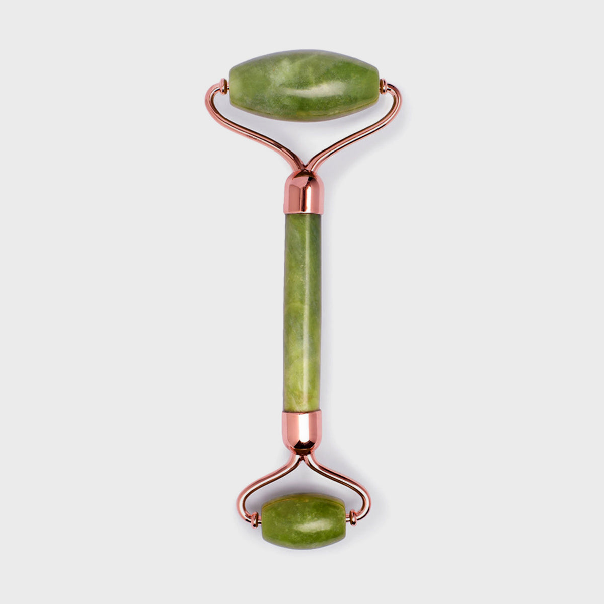 Dual-ended jade facial roller with rose gold metal accents