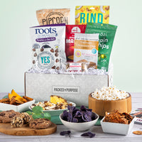 Thumbnail for Open gift basket labeled ‘Scrumptious Healthy Snacks’ with veggie chips, popcorn, dried fruit, and vegan cookies.