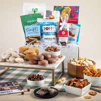 Thumbnail for Open gift basket labeled ‘Scrumptious Shareables’ with chocolate sandwich cookies, toffee, popcorn, and savory nuts.